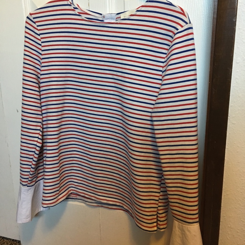 From Anthropologie a shirt with white cuffs!